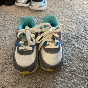 Multi colored nike sneakers for baby boy. Barely worn